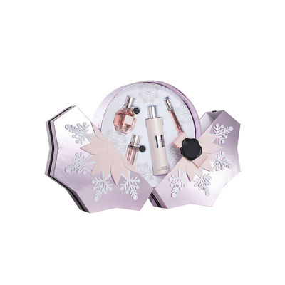 Le flocon de neige forment des boîte-cadeau de parfum