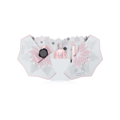 Le flocon de neige forment des boîte-cadeau de parfum