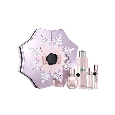 Le flocon de neige forment des boîte-cadeau de parfum