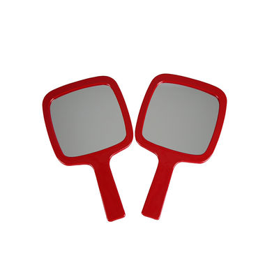 Miroir en cuir de maquillage de voyage de Faux rouge tenu dans la main pour le rasage de toilettage
