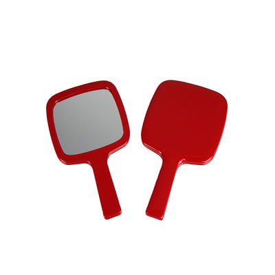 Miroir en cuir de maquillage de voyage de Faux rouge tenu dans la main pour le rasage de toilettage